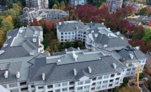 low-slope roofing across residential buildings